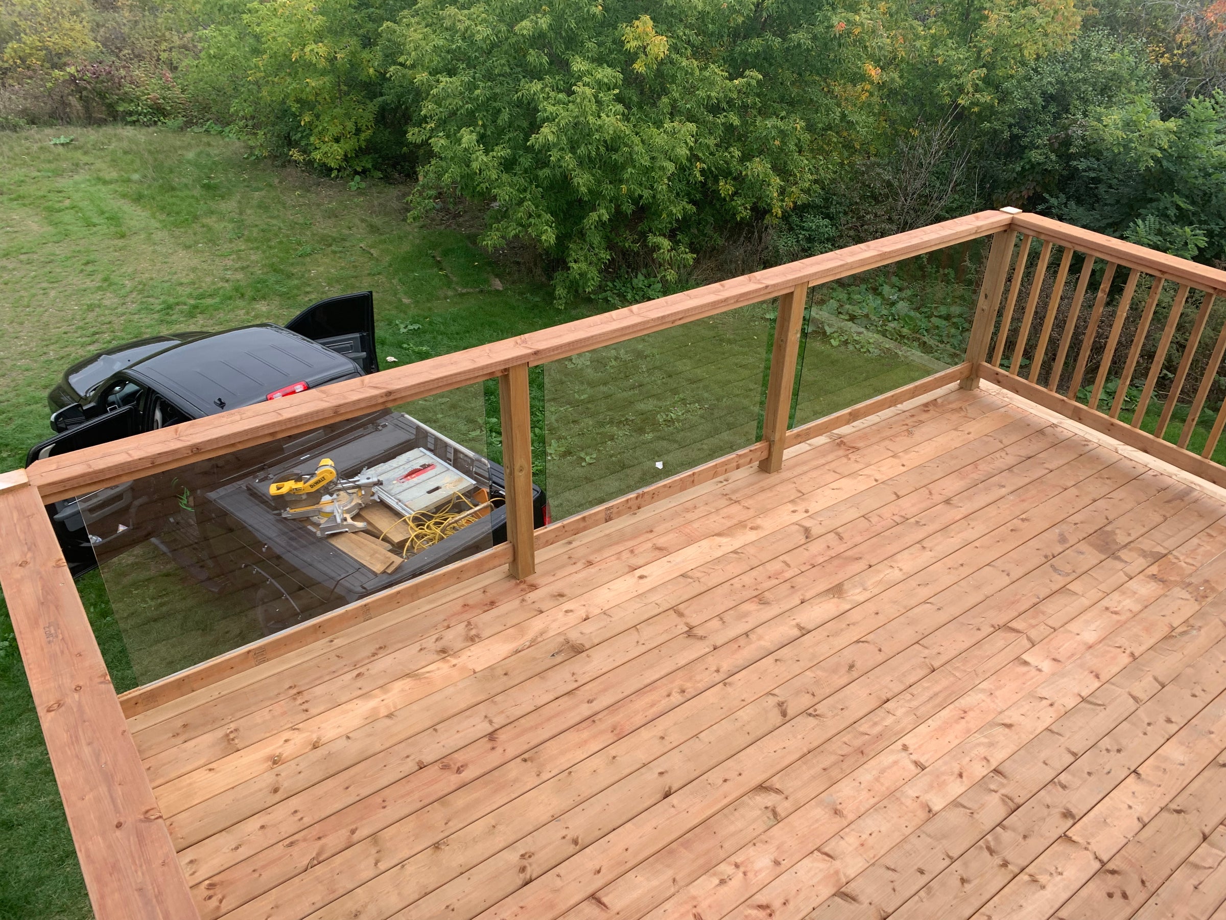 Second Level Pressure Treated Deck with custom glass railings Almonte